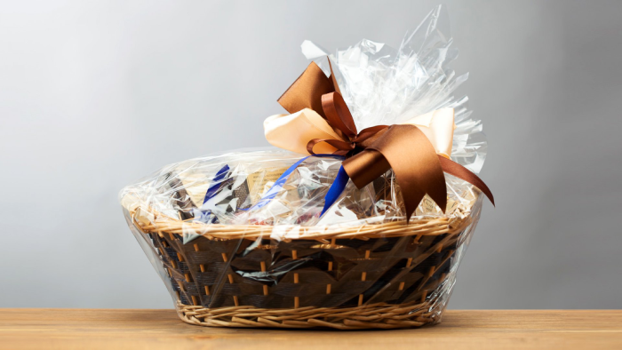Adding decorative elements to the mom's gift basket 